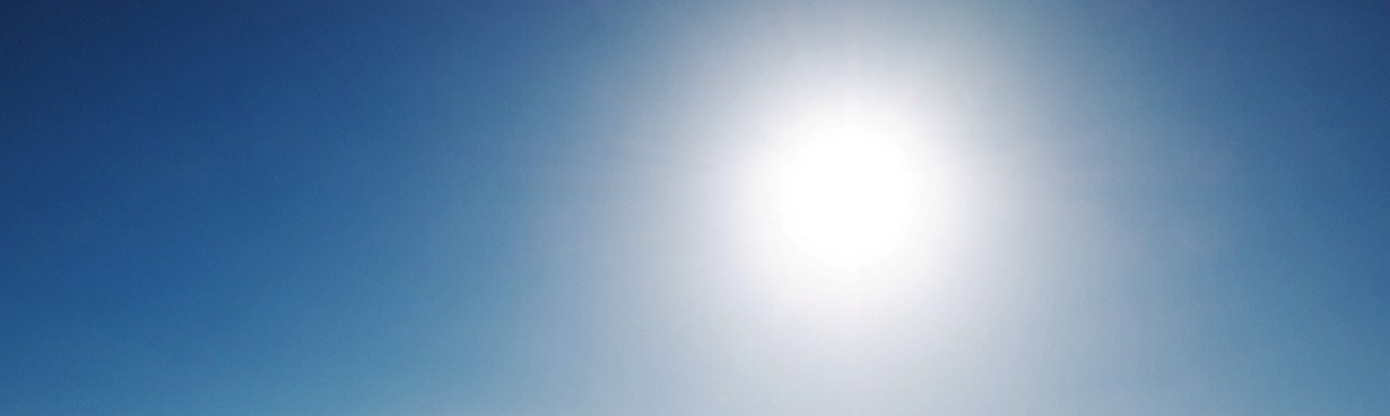 The hot sun a midday one the ocean.